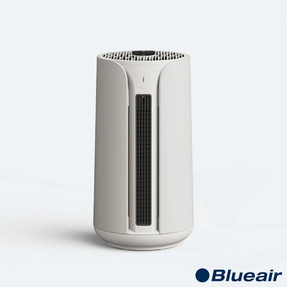 Front view of the beige Blueair ComfortPure T10i 3-in-1 air purifier showing its sleek Scandinavian cylindrical design, digital display, and modern glass touchscreen interface.