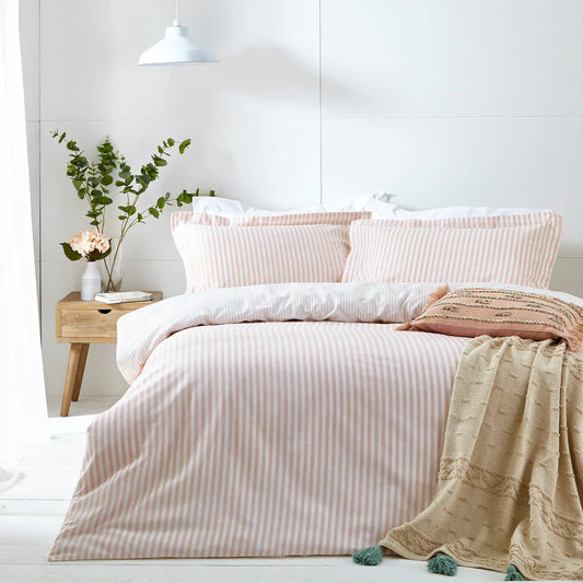 Close-up view of the single Yard Hebden cotton duvet cover in blush pink and white stripes, showing the soft, breathable weave texture.