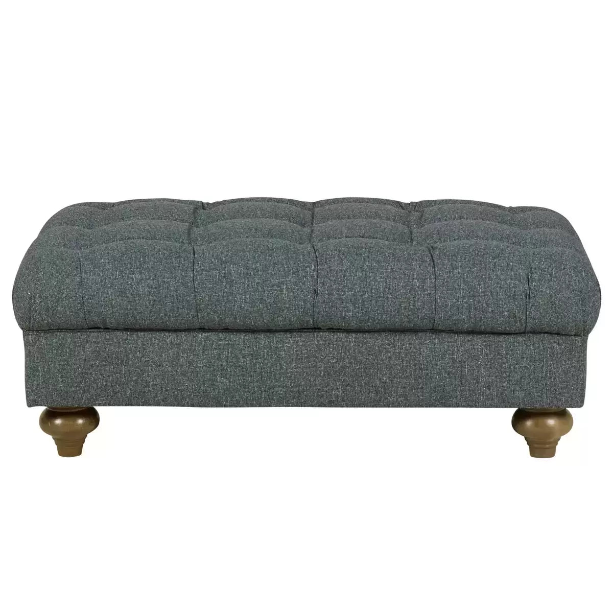 Angled shot of the Bordeaux buttoned fabric footstool in deep blue, showcasing its hand-tied tufting, textured linen-style fabric, and dark stained solid wood legs on a neutral rug.