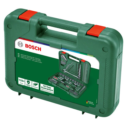 Open green Bosch hard carry case displaying a neatly organized 132 piece hand tool set with ratchets, metric sockets, and screwdriver bits on a workshop bench.