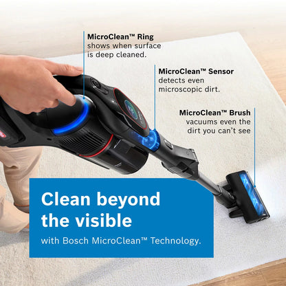 Profile view of the black Bosch BCS1051GB Unlimited 10 ProPower cordless vacuum cleaner with its blue MicroClean LED ring illuminated while cleaning a modern hardwood floor.