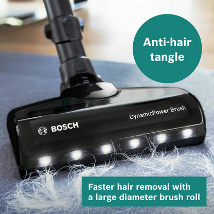 Front view of the white and turquoise Bosch Unlimited 7 Aqua cordless vacuum cleaner standing on light timber flooring with its dual spinning mop head and turquoise accents exposed.