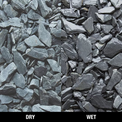 Bowland Stone 40mm Blue Slate displayed in a garden border, showcasing its natural texture and depth of colour.