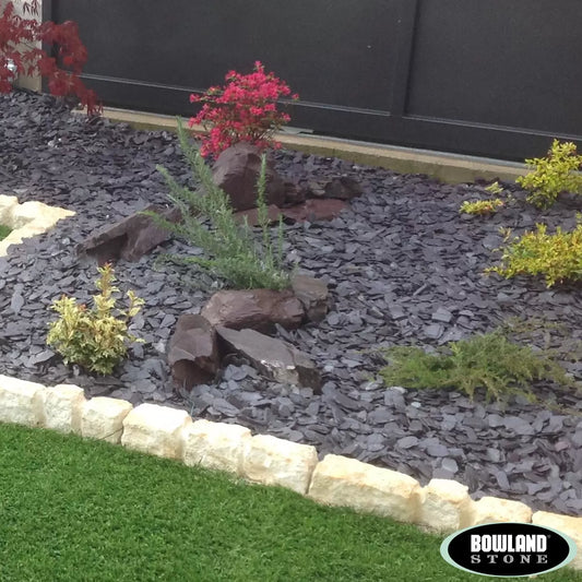 Large 750kg bulk bag of natural green slate chippings for garden landscaping and decorative borders.