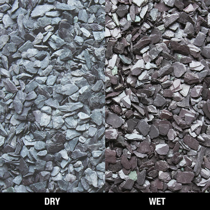 Bowland Stone 20mm Plum Slate displayed in a garden border, showcasing its natural texture and depth of colour.