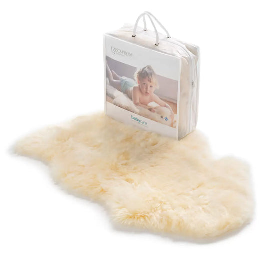Bowron Lambskin Longwool Baby Rug in cream white used as a plush nursery play mat.