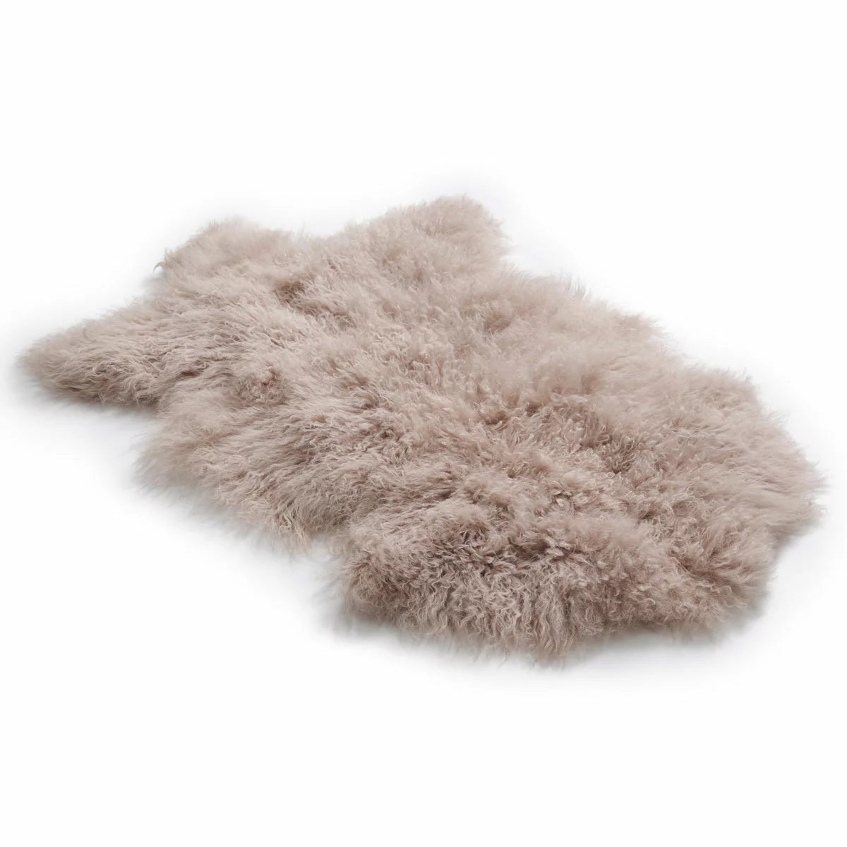 Overhead shot of a soft white Bowron Tibetan Sheepskin Rug draped across a Scandinavian wooden armchair showing long, silky wool curls.