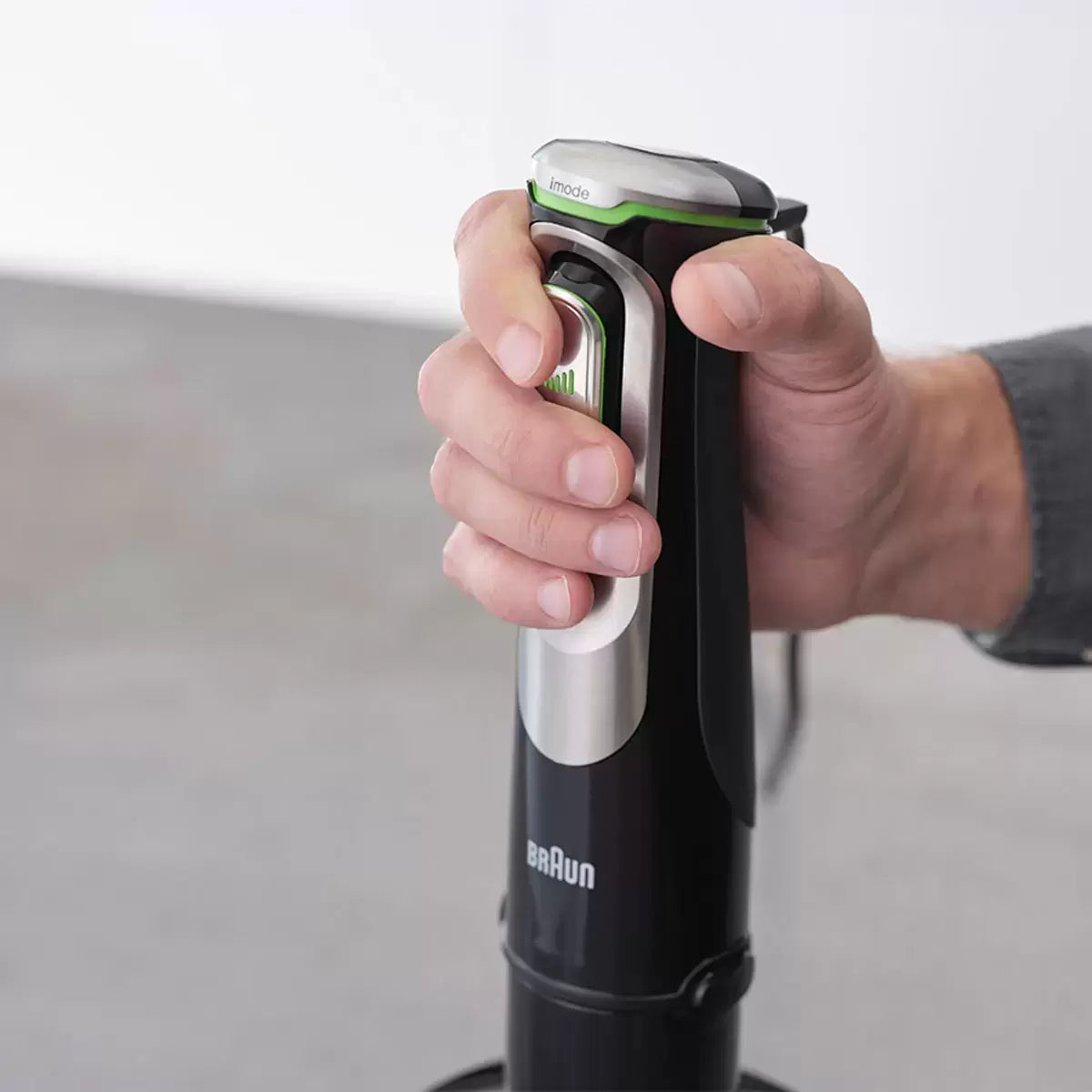 The Braun MultiQuick 9 MQ9187XLI hand blender base shown with its full array of professional-grade attachments, including the 2L food processor and stainless steel whisk on a clean kitchen surface.