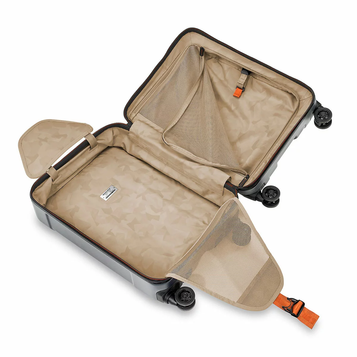Sleek graphite grey Briggs & Riley Torq 53cm carry-on spinner suitcase showing its open hinged front pocket with a laptop inserted inside.