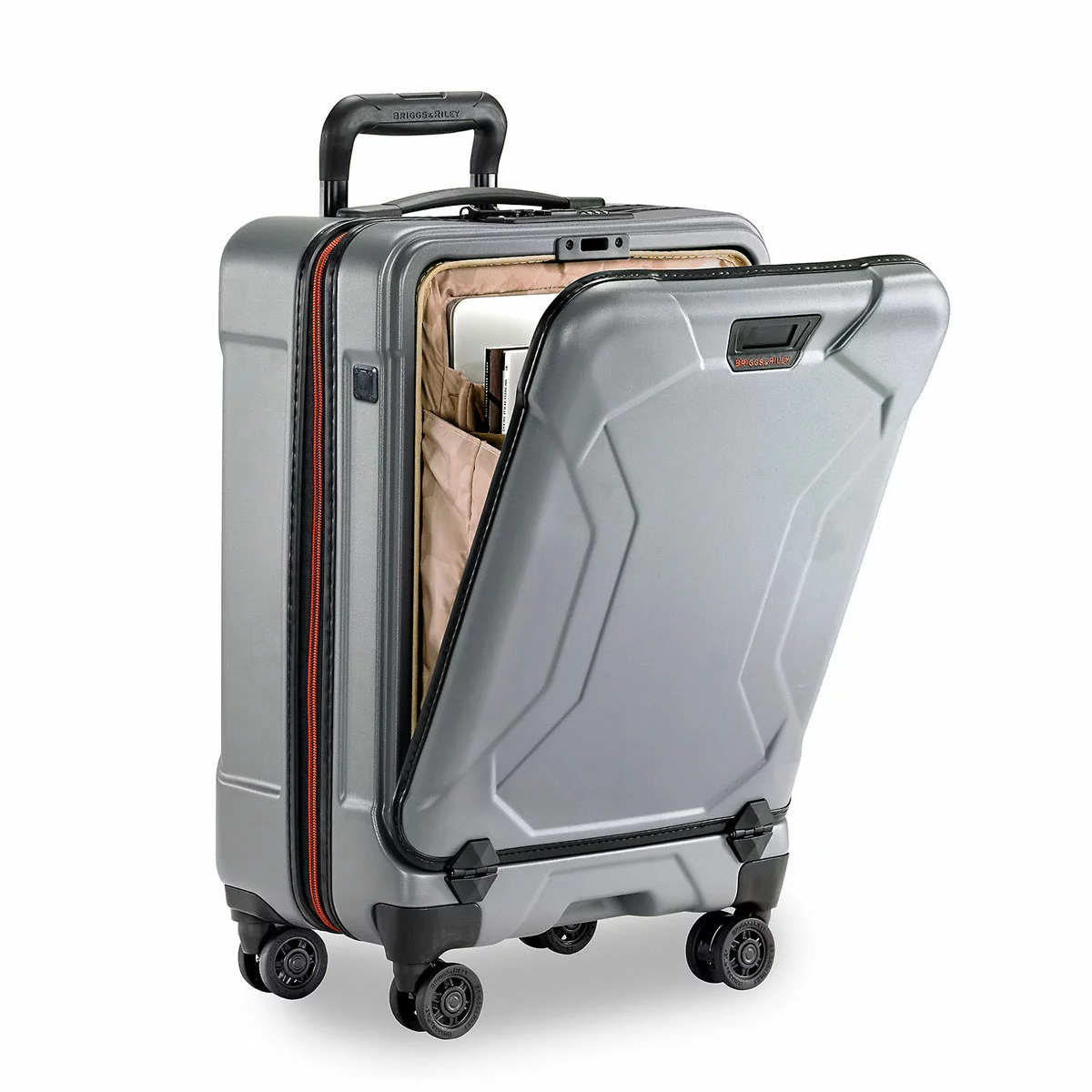 Sleek graphite grey Briggs & Riley Torq 53cm carry-on spinner suitcase showing its open hinged front pocket with a laptop inserted inside.