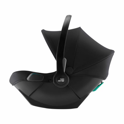 Close-up image of the adjustable headrest and 3-point safety harness on the Britax Romer Baby Safe Core i-Size infant carrier.