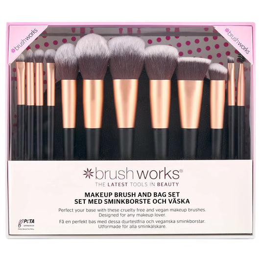 Complete 12-piece Brushworks black makeup brush set displayed alongside a baby pink zip storage pouch on a clean surface.