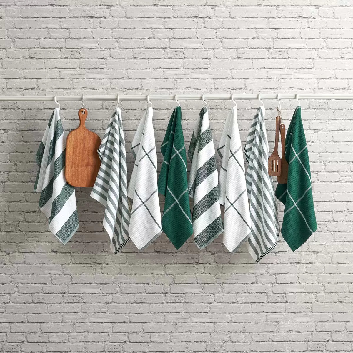 Pack of eight Caro Home kitchen towels in three assorted colours displayed for kitchen cleaning and drying.