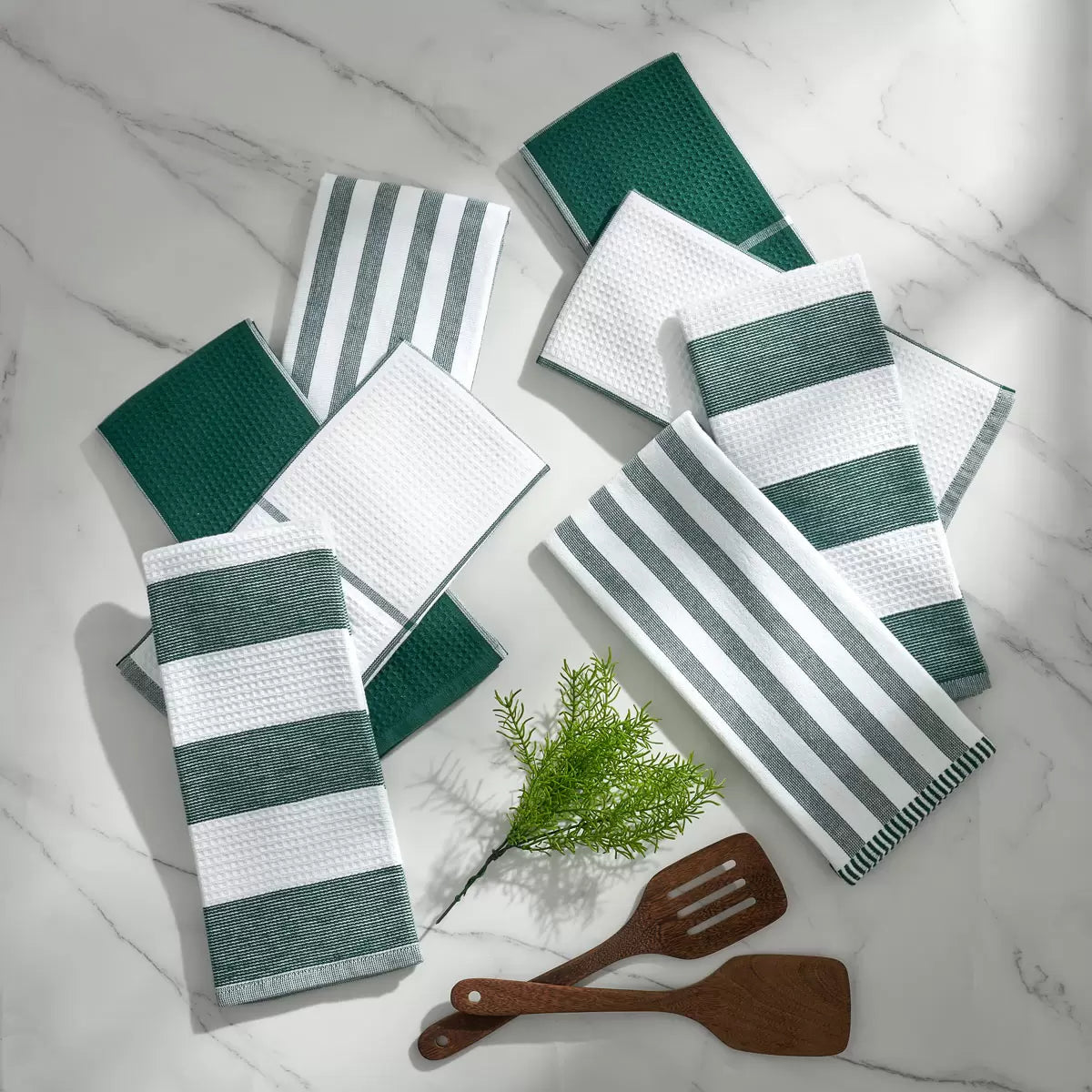 Pack of eight Caro Home kitchen towels in three assorted colours displayed for kitchen cleaning and drying.