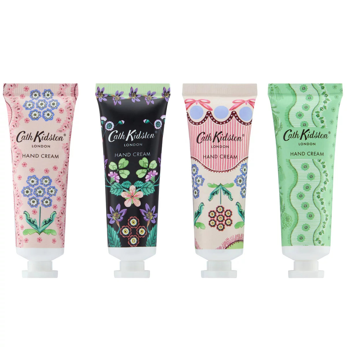 Flat lay arrangement of eight colorful Cath Kidston 30ml hand cream tubes featuring hand-painted flower patterns around an opened gift box.