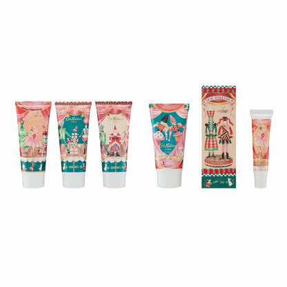 Front view of the Cath Kidston Nutcracker decorative metal tin displayed alongside six festive bath and body care products against a neutral background.