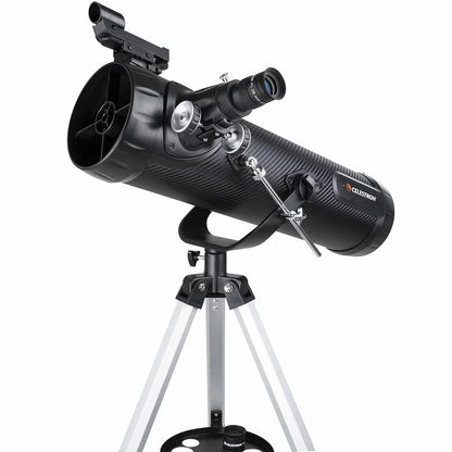 Carbon fibre finish Celestron 114AZ-SR reflector telescope on an aluminum tripod with a smartphone mounted to the eyepiece.