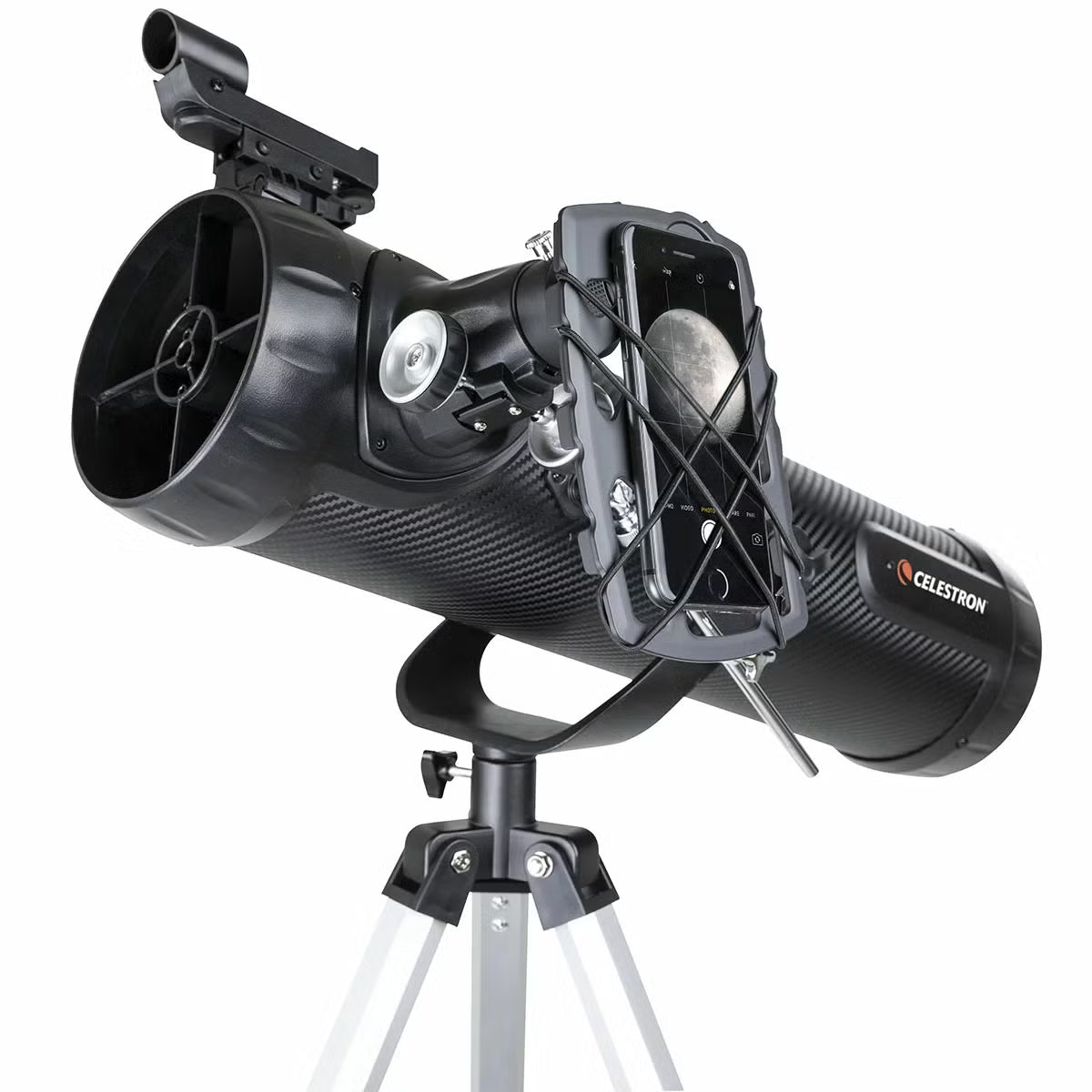 Carbon fibre finish Celestron 114AZ-SR reflector telescope on an aluminum tripod with a smartphone mounted to the eyepiece.