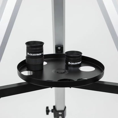 Carbon fibre finish Celestron 114AZ-SR reflector telescope on an aluminum tripod with a smartphone mounted to the eyepiece.