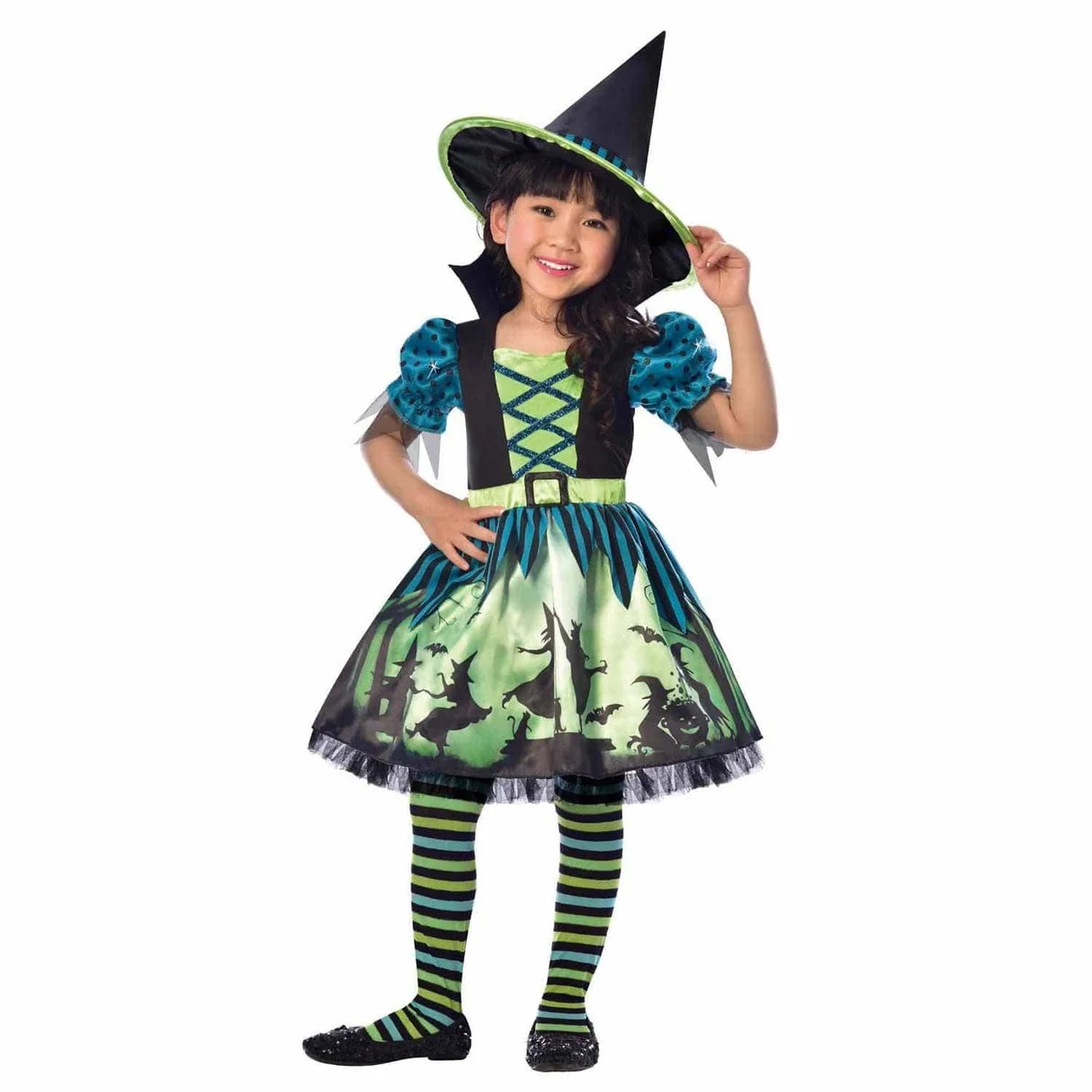A child wearing a classic black Hocus Pocus witch costume complete with a tall pointy hat and holding a toy broom outdoors against an autumn backdrop.
