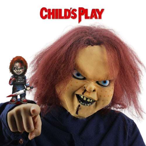 Front view of a Child's Play Chucky horror latex mask featuring realistic red synthetic hair, facial scar details, and wide eye cutouts.