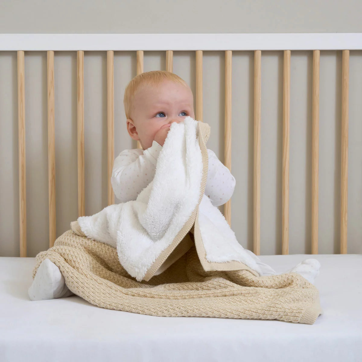 Clair De Lune organic cotton sherpa blanket laid flat to showcase the 70 x 100 cm size and dual-sided texture.