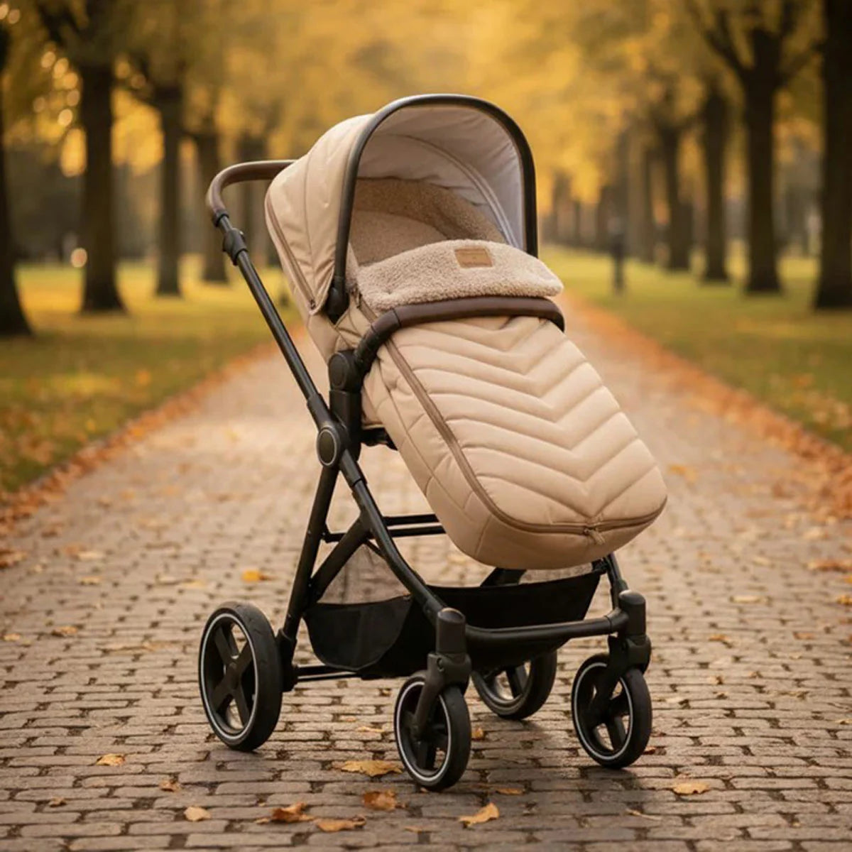 Clair De Lune Snug Universal Pushchair Footmuff featuring cozy teddy fleece lining, securely fitted to a modern baby stroller.