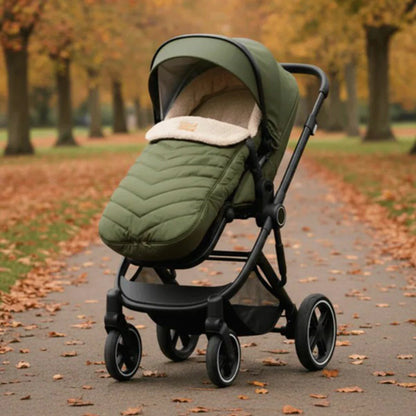 Clair De Lune Snug Universal Pushchair Footmuff featuring cozy teddy fleece lining, securely fitted to a modern baby stroller.
