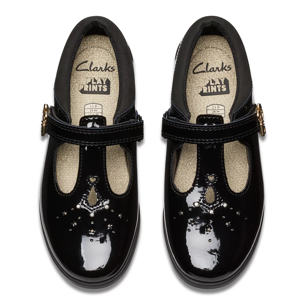 Side angle view of Clarks Kids Lock Shine black patent T-bar school shoes featuring a buckle accent and grippy rubber sole.
