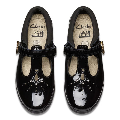 Side angle view of Clarks Kids Lock Shine black patent T-bar school shoes featuring a buckle accent and grippy rubber sole.