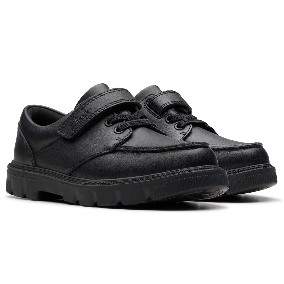 Side view of Clarks Kids Lorcam Edge Black Leather School Shoes featuring elastic laces, a secure riptape strap, and a flexible dark rubber sole.