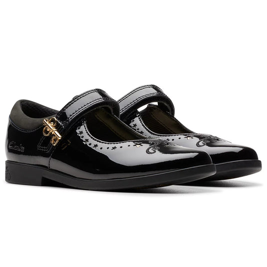 Front angle view of black patent leather Clarks Kids Lock Magic school shoes with riptape strap and key detail design on a neutral studio background.