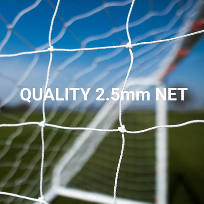Front angle view of the white Quickplay Q-Fold 6x4 football goal standing secure on a green turf field with its net fully tensioned.
