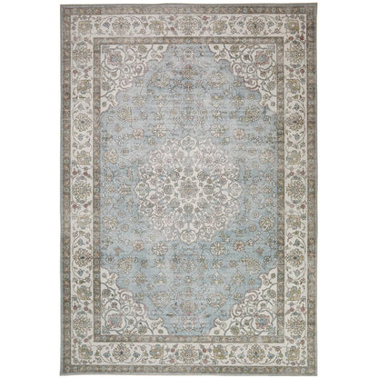 Top-down view of the Concept Looms Liberty Blue Washable Rug showcasing its rich blue vintage pattern and velvet short-pile texture on light hardwood flooring.
