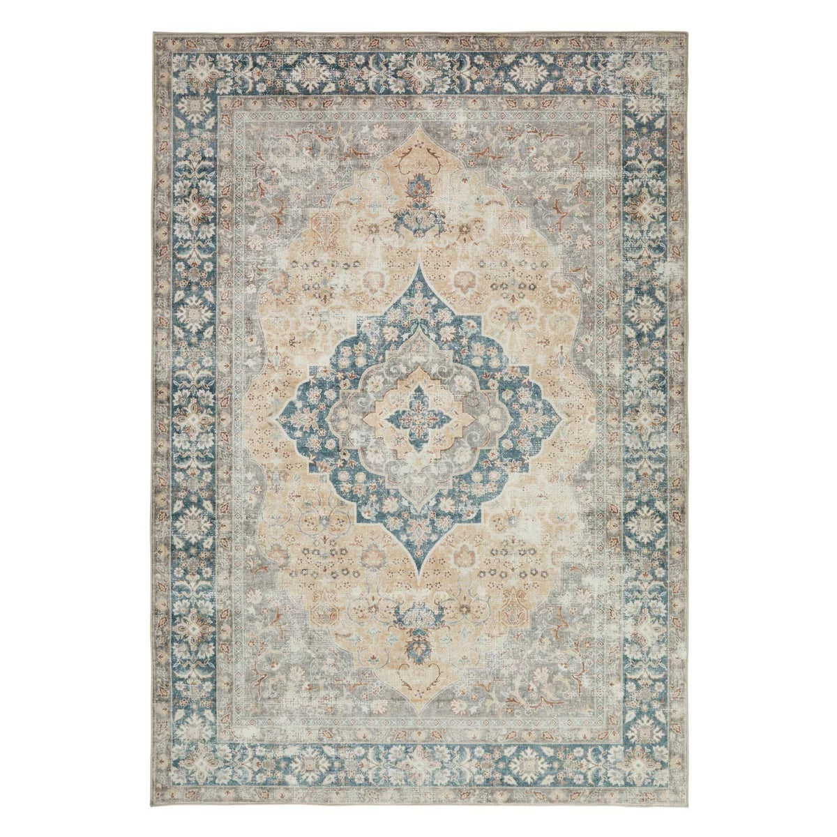 Close-up angle of the gold-patterned Concept Looms Liberty Washable Rug resting flat on a modern wood floor showing its soft 4mm velvet surface.
