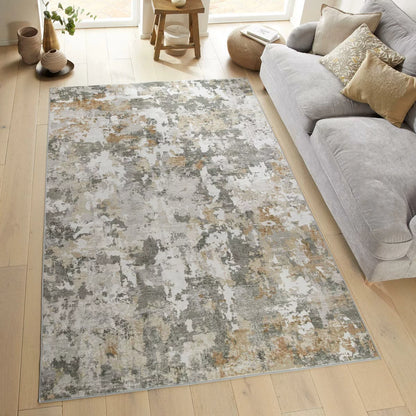 Flat-lay angle of the gray Concept Looms Liberty Quarry Washable Rug showing its smooth short-pile velvet surface and non-slip backing on light flooring.