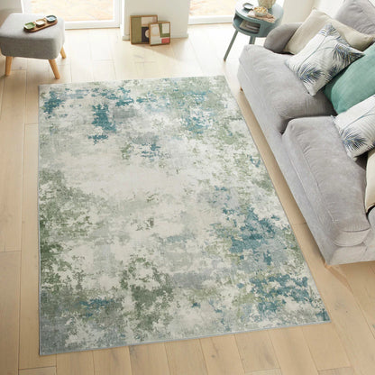 Flat-lay top view of the soft seafoam velvet texture and short 4mm pile on the Concept Looms Liberty Seafoam Washable Rug.C