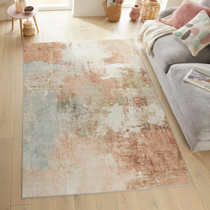 Top-angle view of the plush Concept Looms Liberty Spring Washable Rug laid out on a polished hardwood floor in a brightly lit modern living room setting.