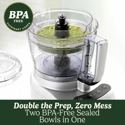 Front angle view of the silver Cuisinart FP1300SU Expert Prep Pro Food Processor set up with its 3L bowl and blade accessories on a clean kitchen counter.
