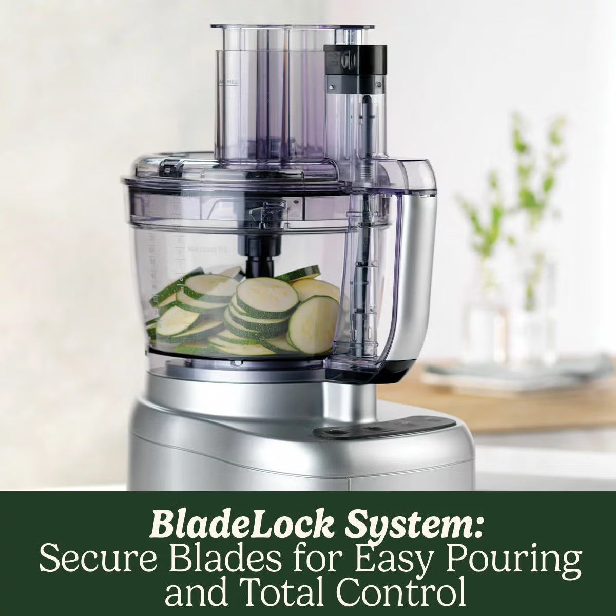 Front angle view of the silver Cuisinart FP1300SU Expert Prep Pro Food Processor set up with its 3L bowl and blade accessories on a clean kitchen counter.