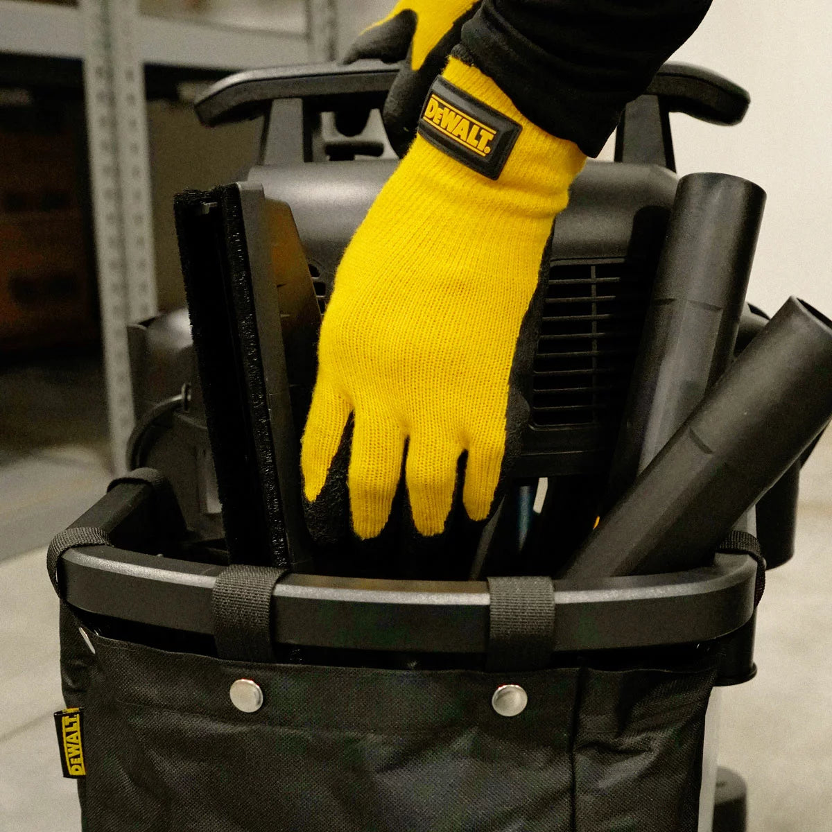 DEWALT 38 litre wet and dry corded vacuum cleaner with 2.1m hose for heavy-duty workshop and industrial cleaning.