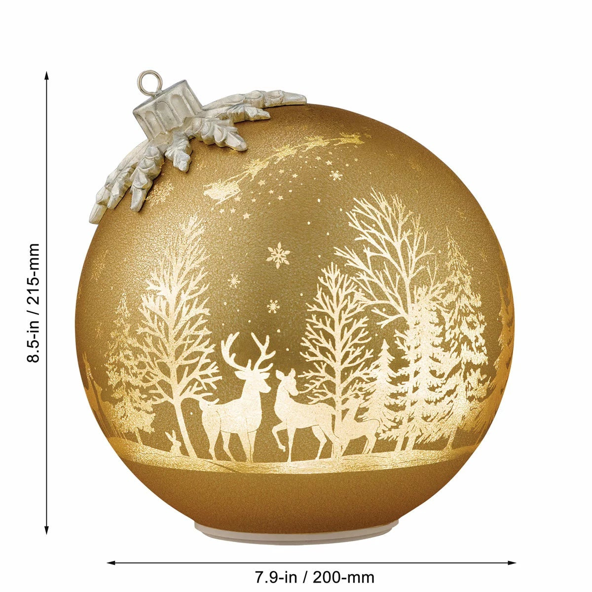 Pair of illuminated frosted glass rotating ball ornaments featuring etched reindeer and winter forest scenes glowing on a modern mantelpiece.