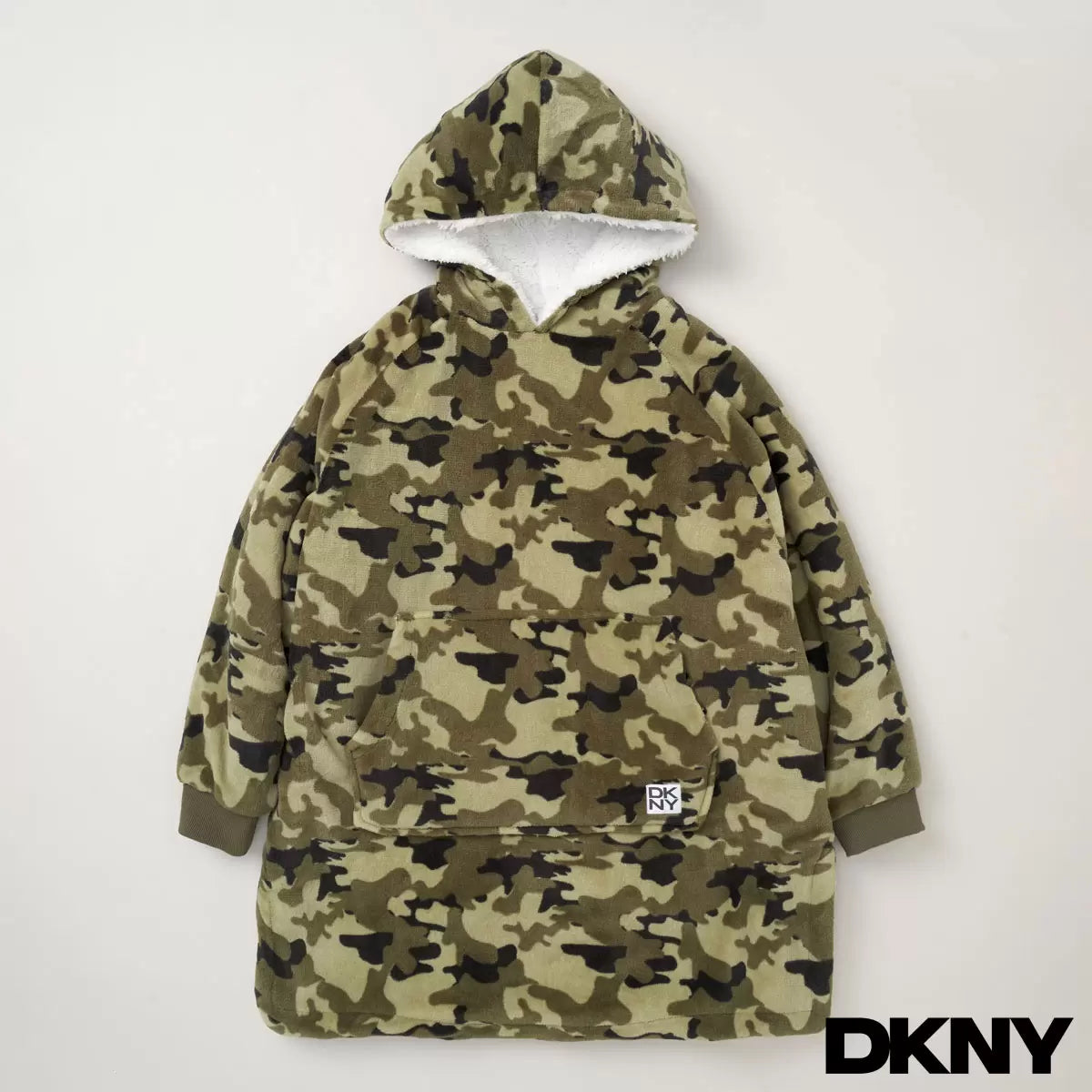 Front view of a plush black DKNY kids oversized hoodie displaying the fluffy sherpa fleece interior lining and front kangaroo pocket on a clean neutral background.