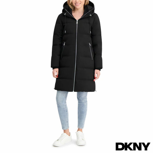 DKNY ladies long down puffer coat with hood in black shown in a full-length view on model against a clean studio backdrop.