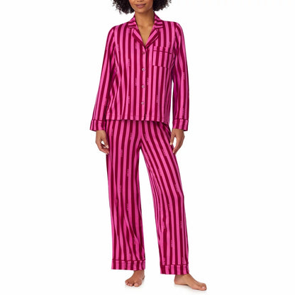 Front view of the DKNY women's notch collar pyjama set in grey with logo piping and button front detailing.