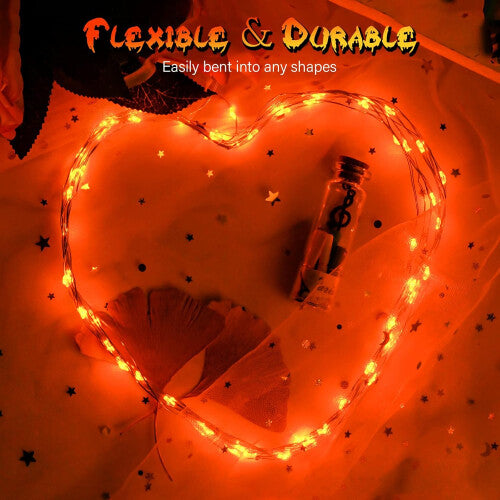 Dalugo 3-metre orange fairy light strand with 30 amber LEDs wrapped neatly around a rustic wooden mantelpiece display.