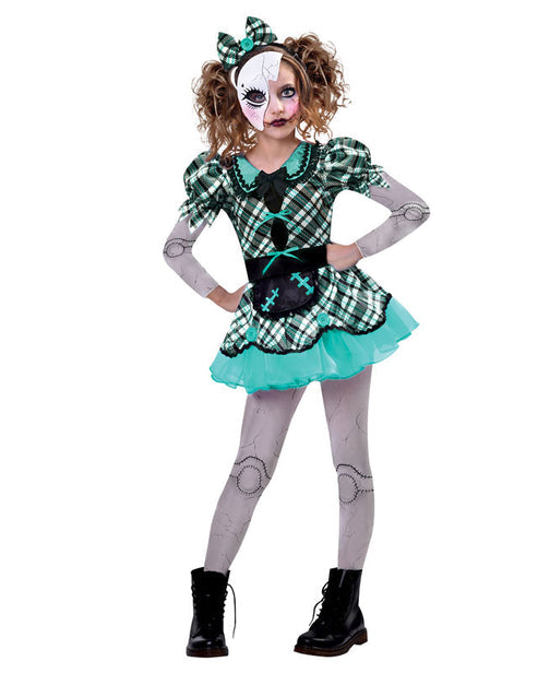 Front view of the Dark Doll child costume featuring a checked multi-layered dress, stitch-print long sleeves and tights, cracked porcelain half-mask, and matching hair bow.