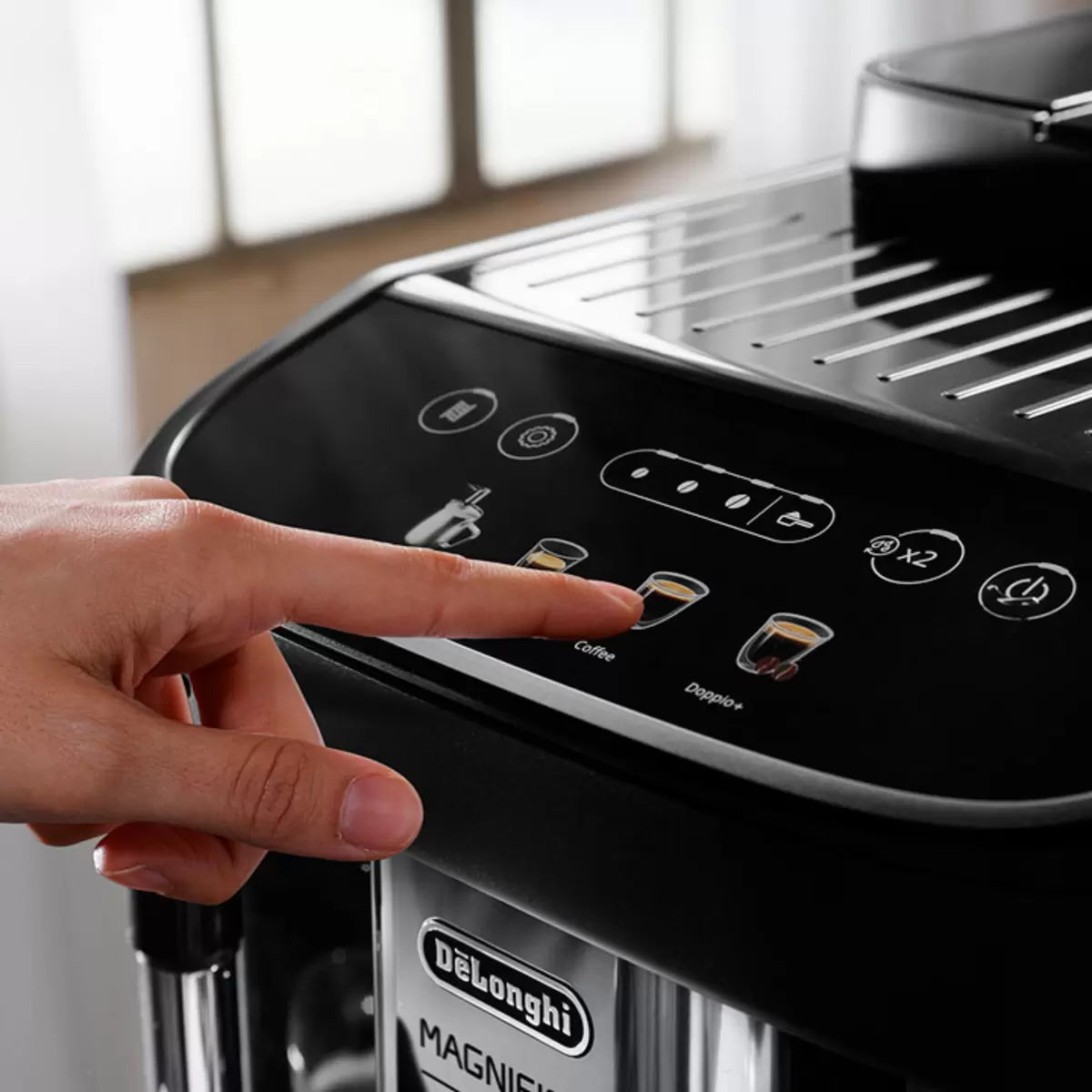 De'Longhi Magnifica Evo ECAM290.22.B bean to cup coffee machine making fresh espresso and cappuccino at home .