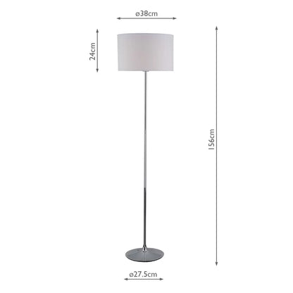 A side-angle shot of the Delta floor lamp featuring a polished chrome tear-shaped base and a clean ivory cotton drum shade casting a soft, warm glow in a contemporary living room corner.