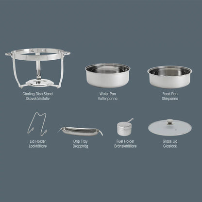 Denmark 8.5-litre round polished stainless steel chafing dish with clear glass lid on a set dining table view.